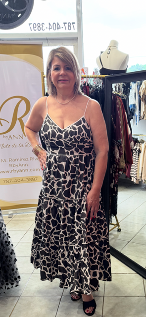 A printed woven midi dress featuring cami top